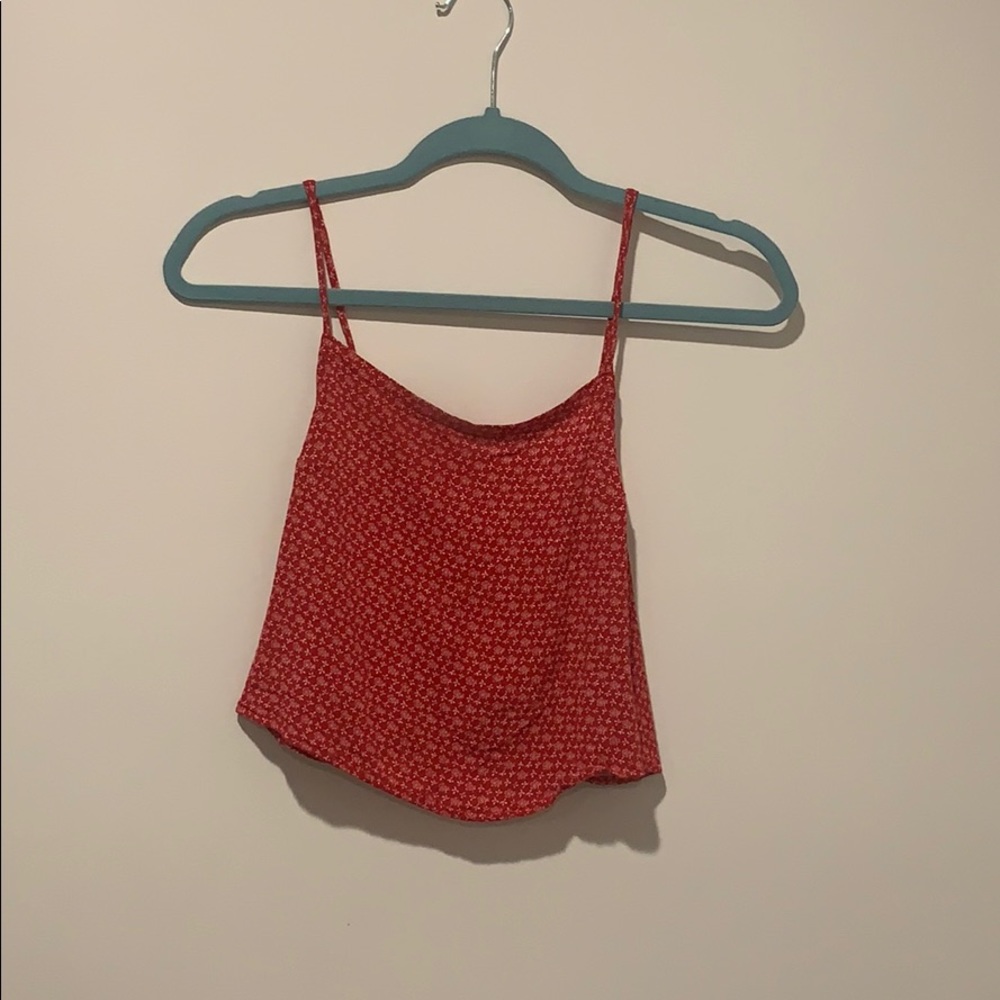 red with white flowers top